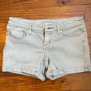muted green mid rise denim shorts